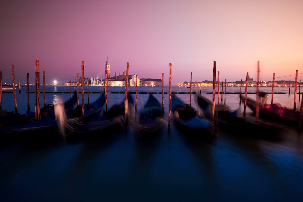 kayaks dock on body of water