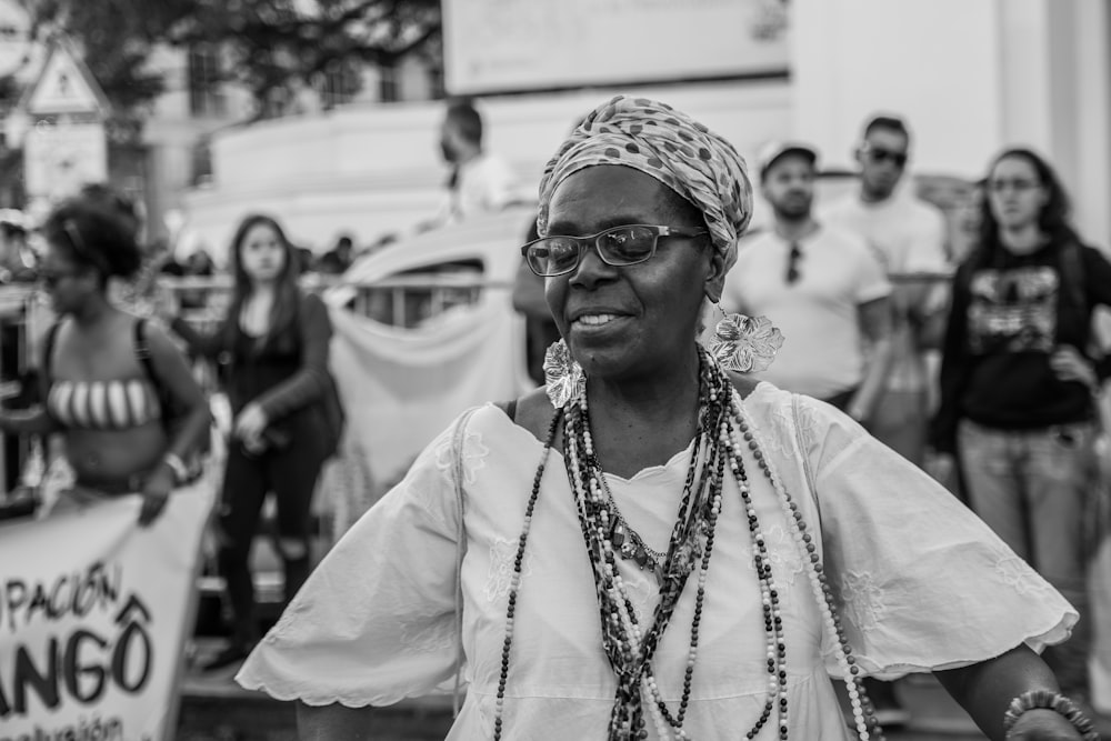 woman standing beside peoples