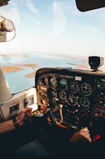 person taking photo inside aircraft
