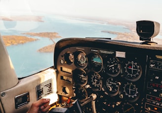 person taking photo inside aircraft