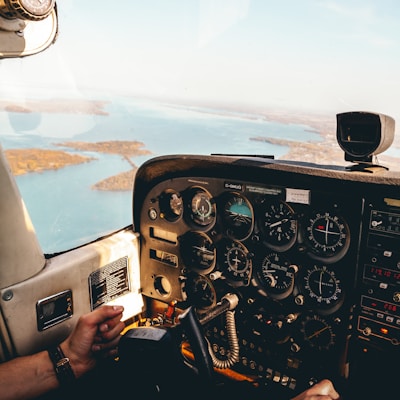 person taking photo inside aircraft