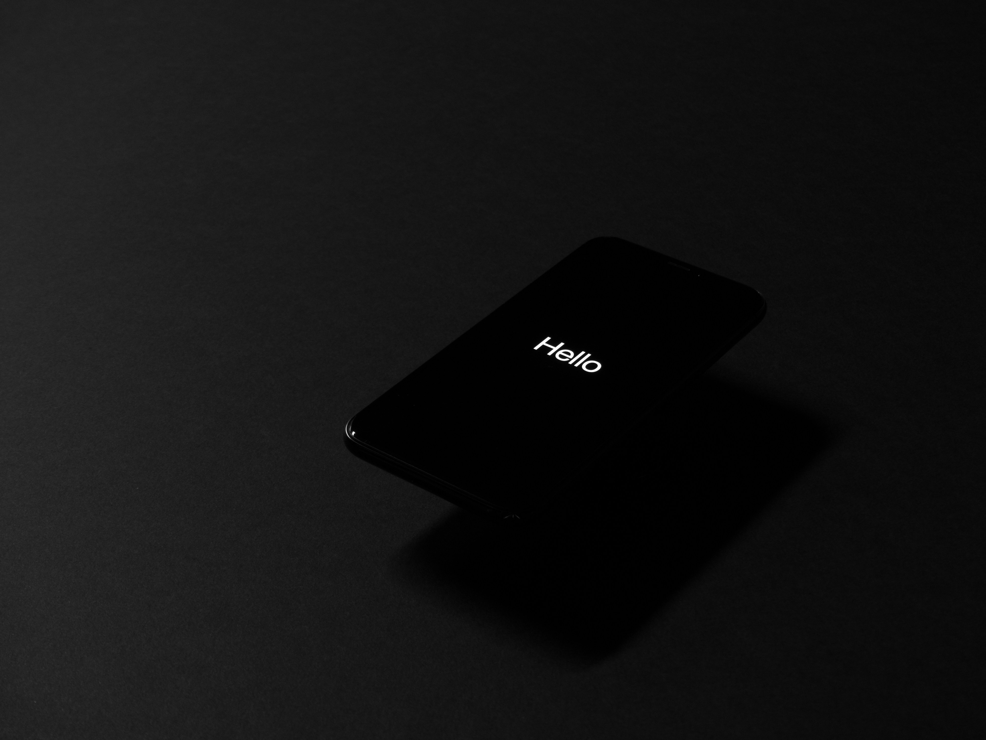 https://www.behance.net/gallery/58951845/Hello-Ten - Playing on the classic Apple tagline, displayed on my first iPhone. The dark background highlights the perfect blacks of the OLED screen. Shot with a point&shoot camera.