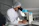 man sight on white microscope