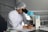 man sight on white microscope
