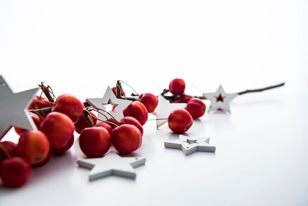 red cherries and white star decorations