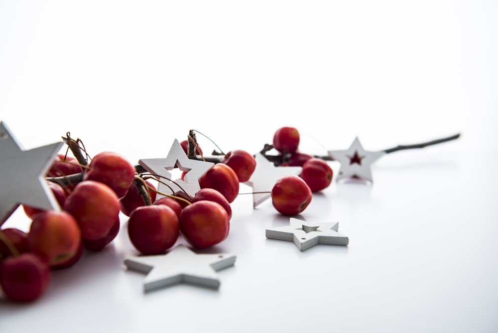 red cherries and white star decorations