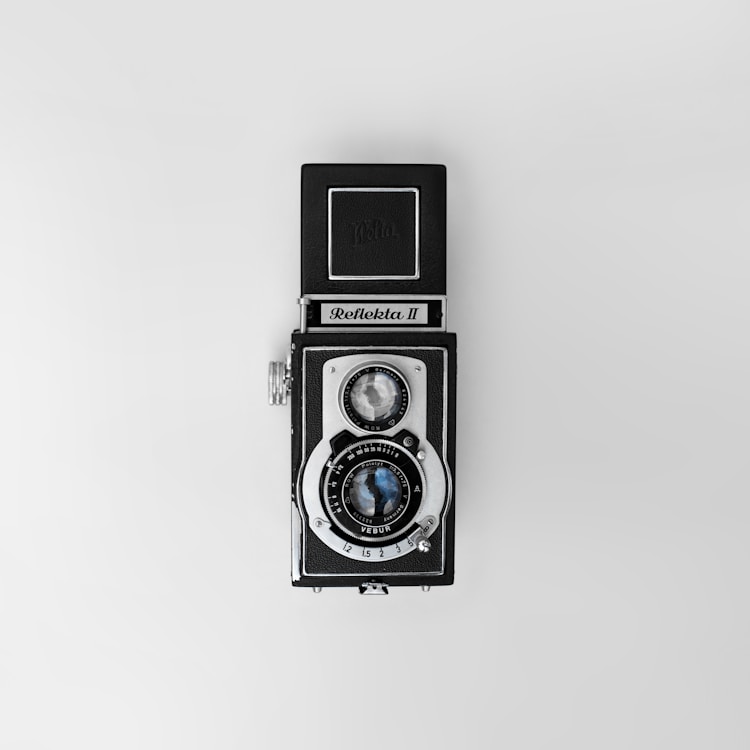 vintage black and gray Reflekta II camera