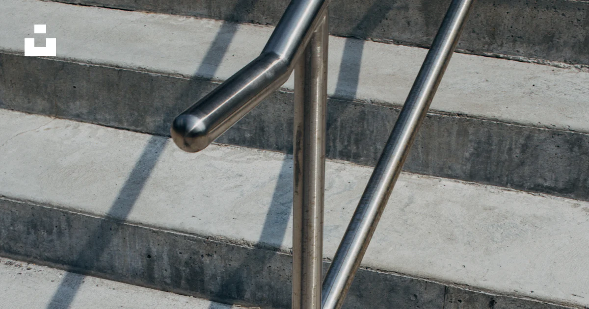 Plaform Handrail Rusting Rust at the base of handrails on stairs photo – Free Grey Image on Unsplash