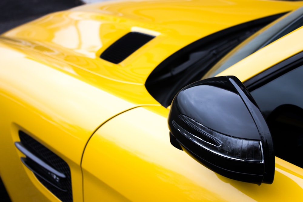 closeup photo of yellow and black car