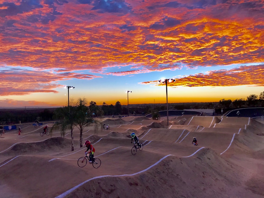 group of person riding bikes