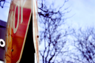 Close-up of a clear stop traffic sign on a sunny day.