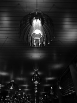 A close-up of intricate lighting fixtures used in a contemporary event setting.