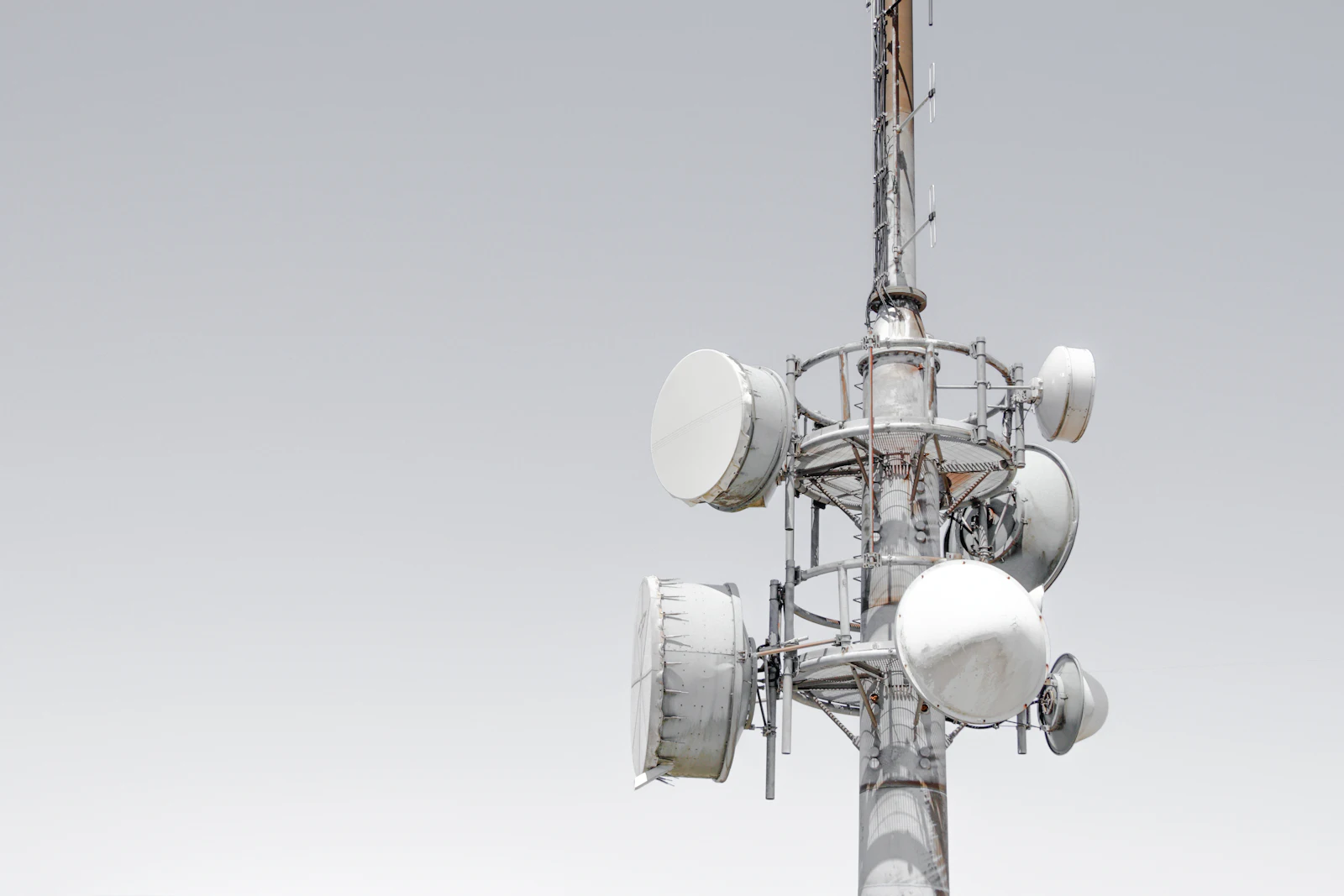 Telecoms tower fitted with antennas and dishes