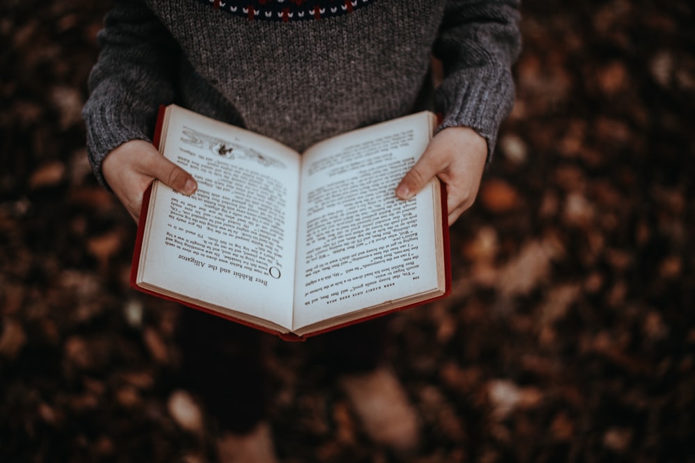 person reading book