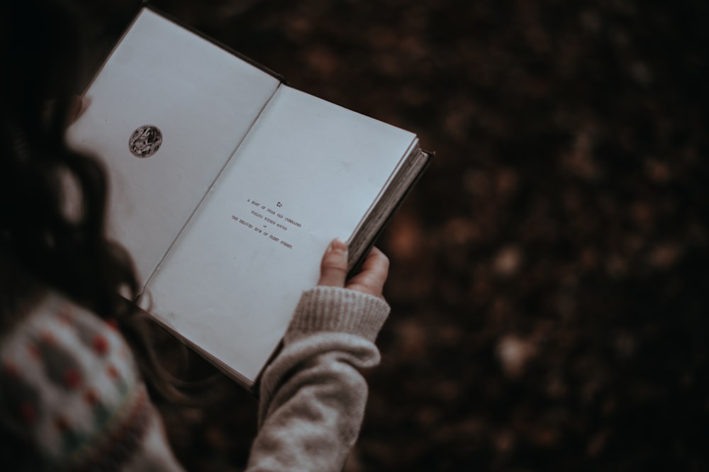 person reading book