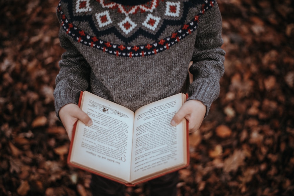 person reading book