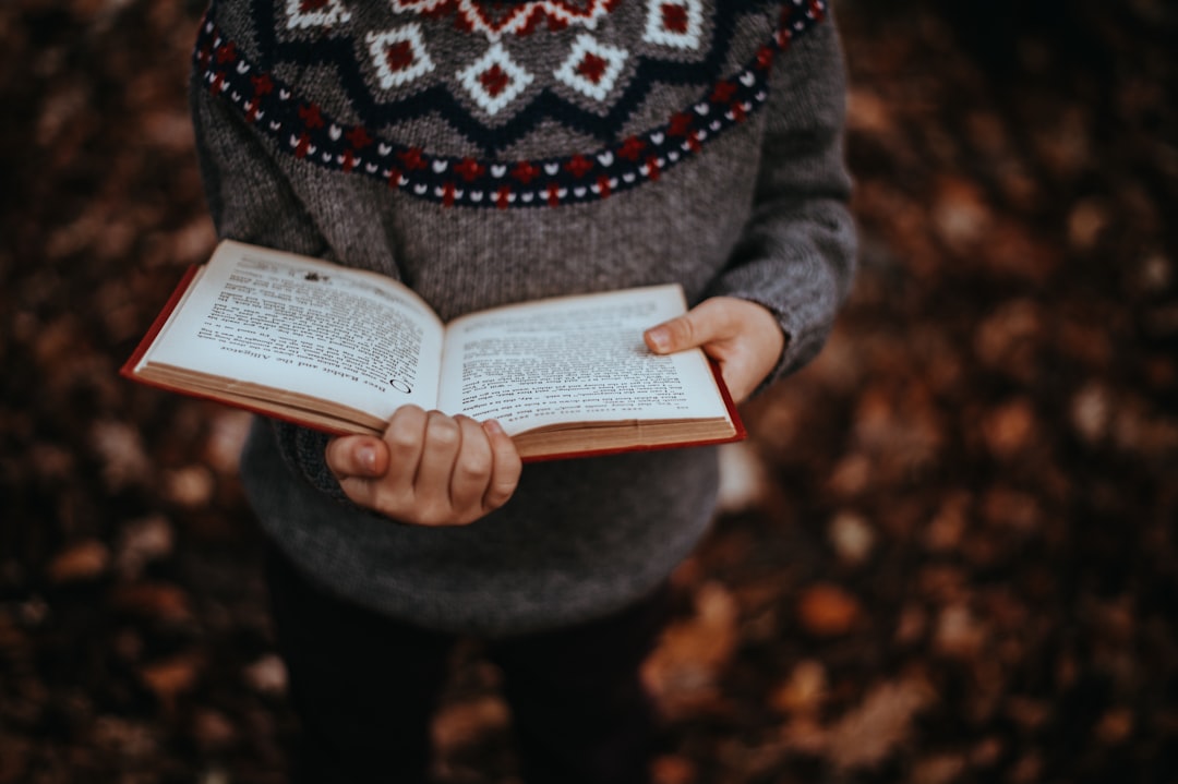 person holding book