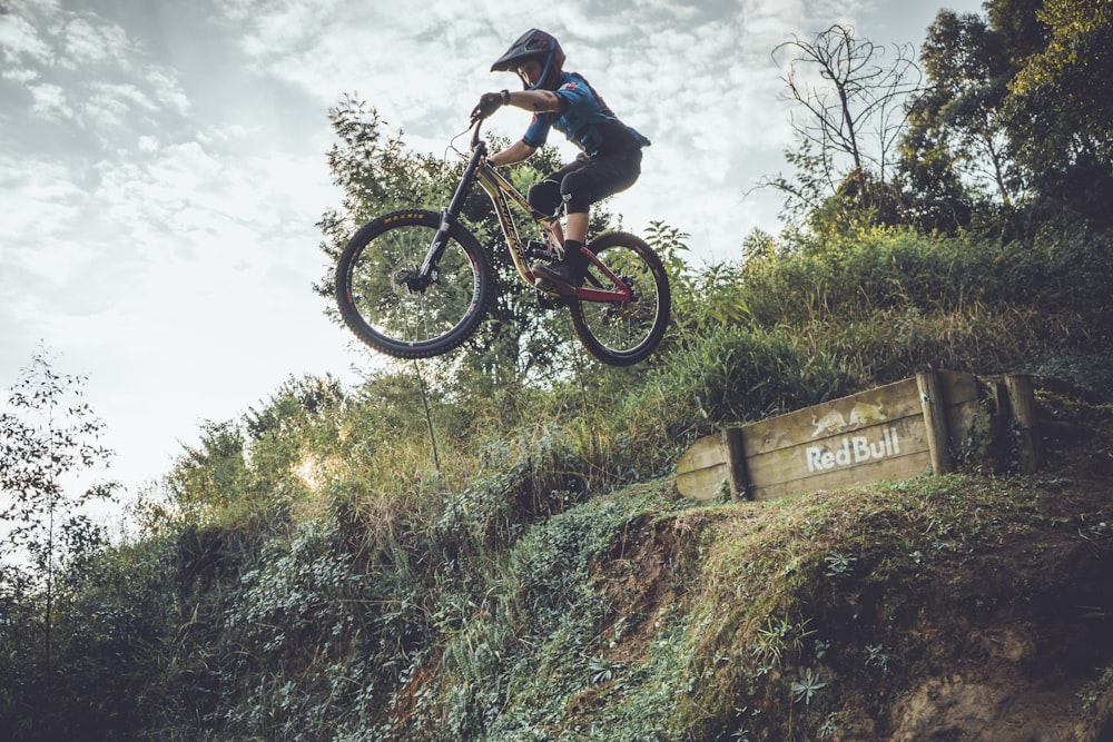 man riding bicycle during daytime