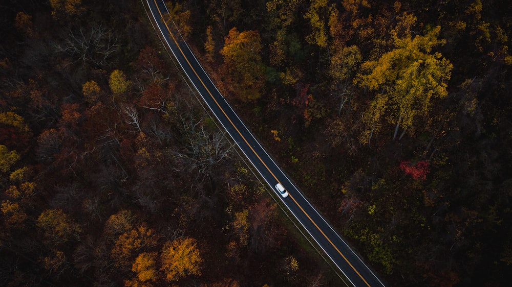 aerial photography of car cascading on highway