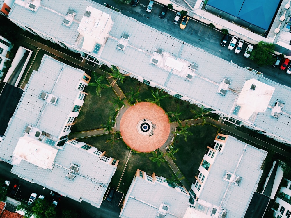 aerial photography of courtyard surrounded by high-rise buildings