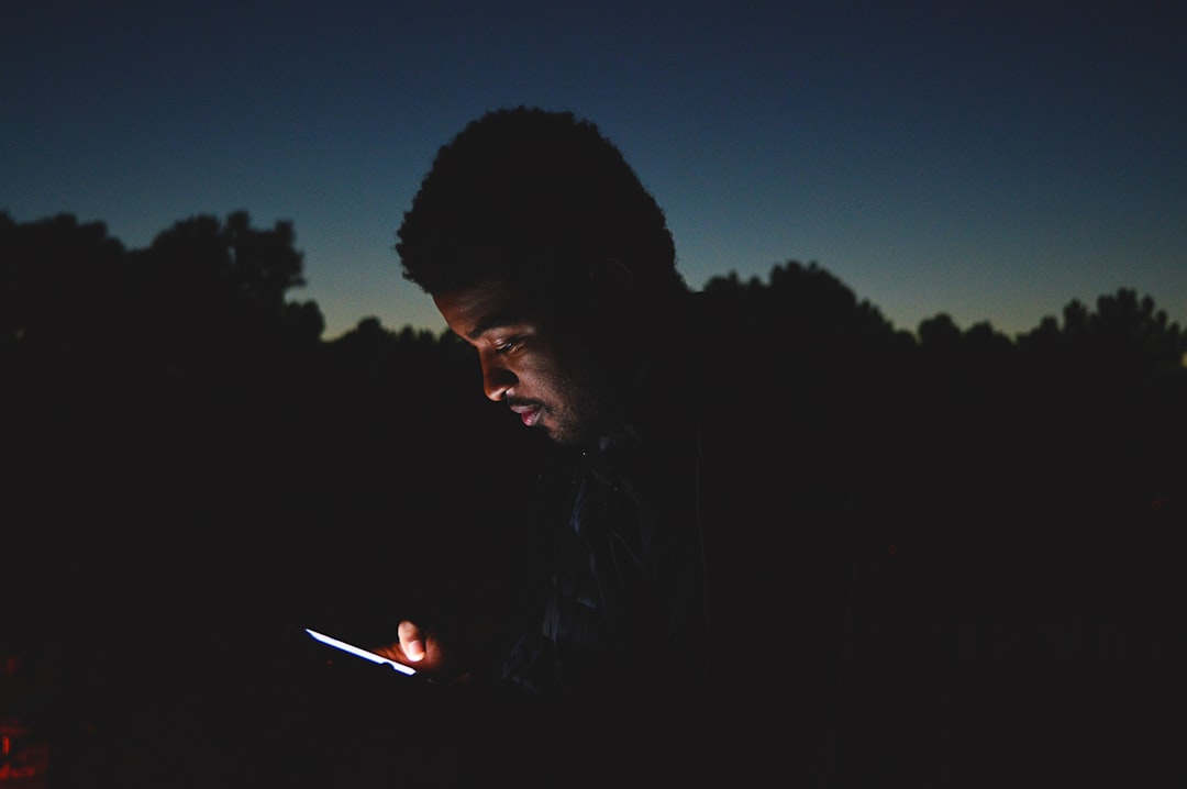 man using smartphone