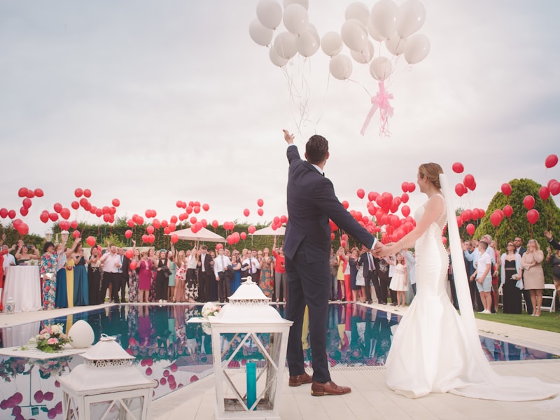 Romantic couple in traditional Indian wedding attire at a grand reception