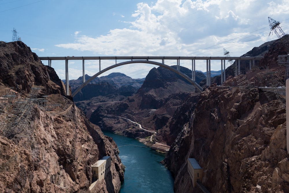 arch bridge connecting two rock mountain