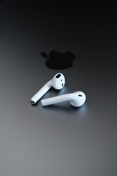 Apple EarPods on gray surface