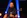 Close-up of a musician passionately playing guitar on stage at Échovif.