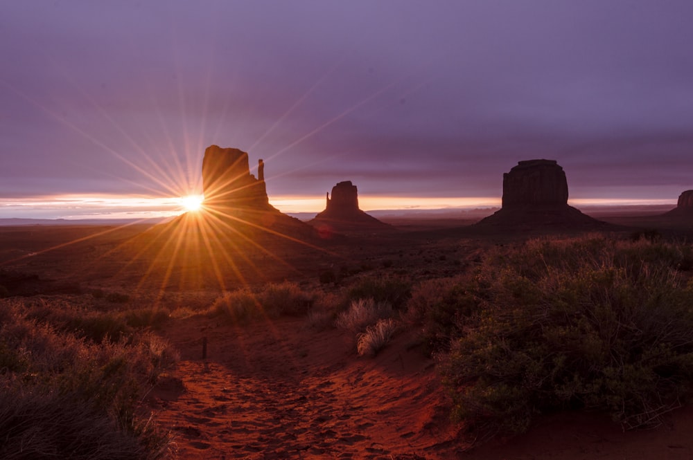 brown rock formations during sunset