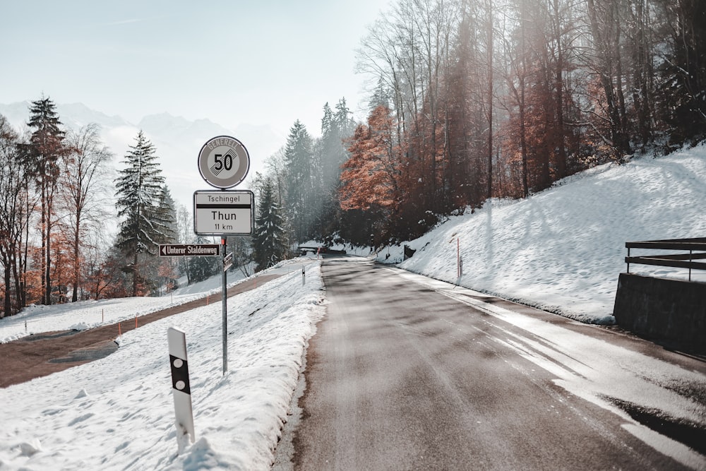 road covered by snow near to mountain