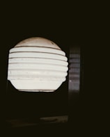 Pearl white glide-inspired décor piece glowing softly against a dark background.