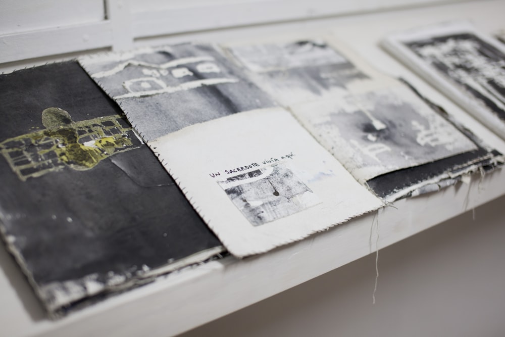 a bunch of papers that are sitting on a table