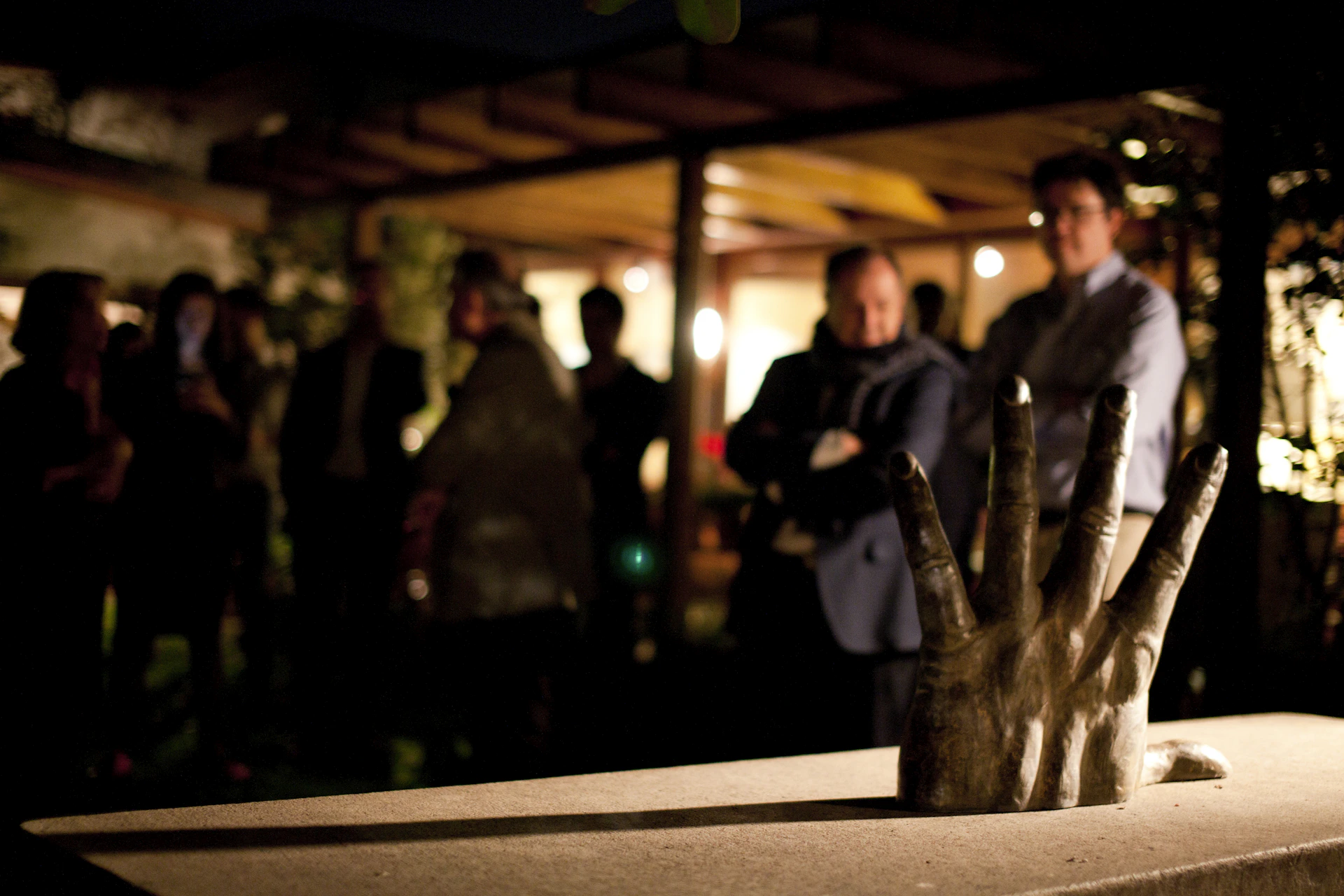 Close-up of a captivating sculpture displayed during a past event, with visitors admiring it.