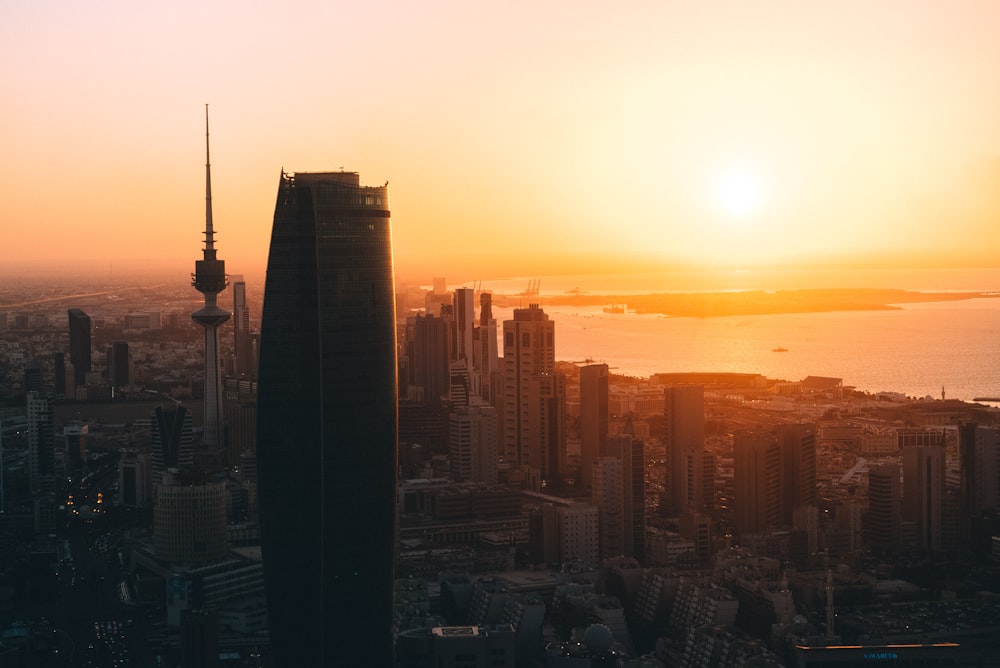 high rise buildings during sunrise