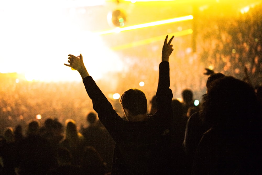 group of people gathering in a indoor colliseum