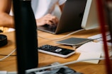 person using silver MacBook