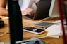person using silver MacBook