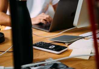 person using silver MacBook