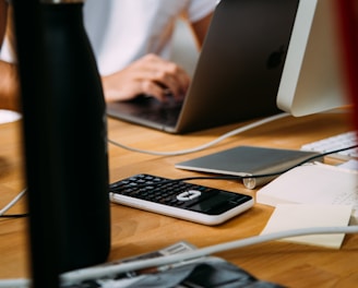 person using silver MacBook