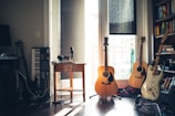 several guitars beside of side table
