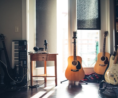 several guitars beside of side table