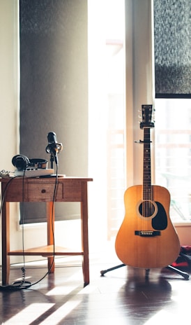 several guitars beside of side table