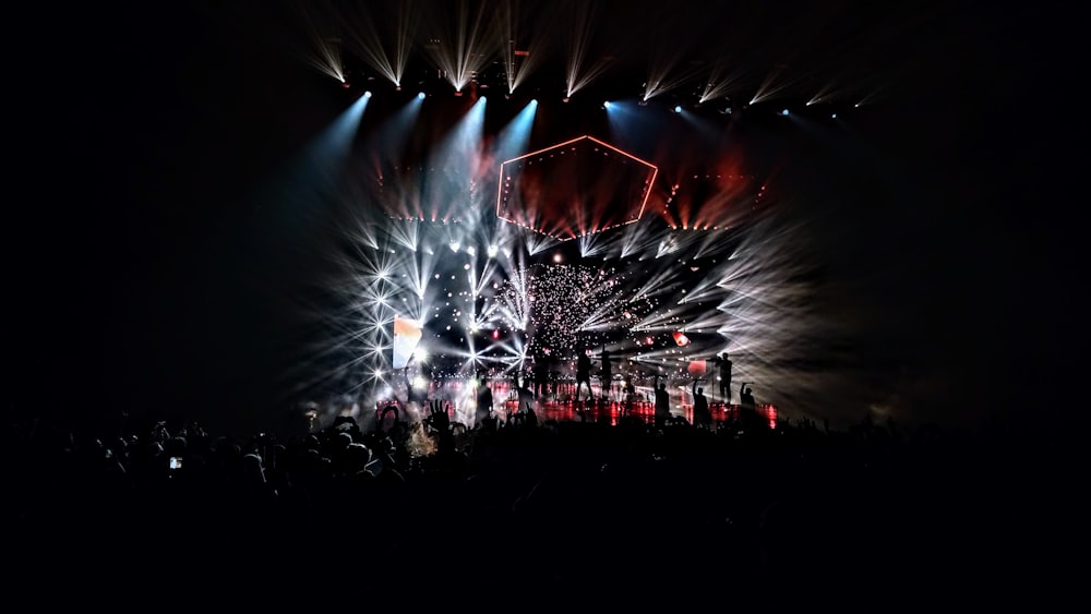 group of people standing in stage