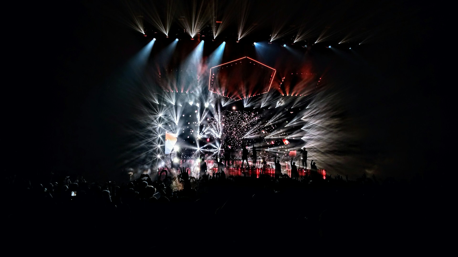 group of people standing in stage