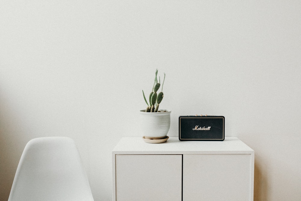 black Marshal speaker on white table