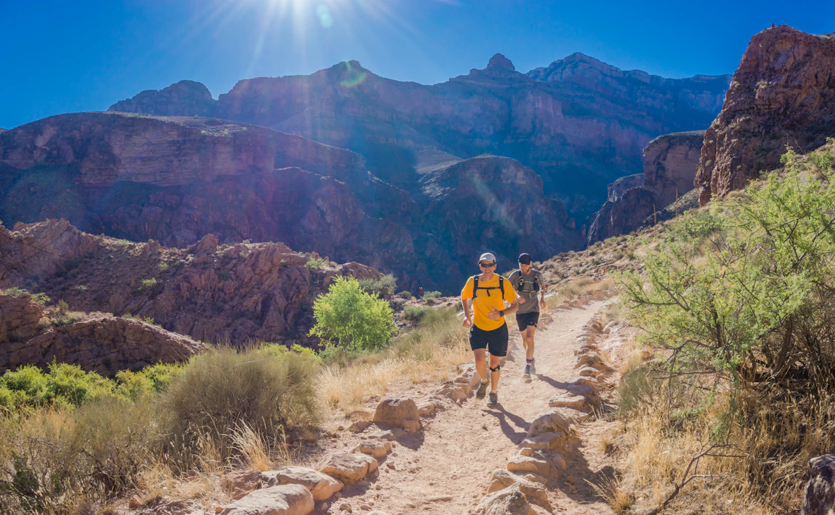 Ultra runners crossing desert terrain during a 47-mile endurance race