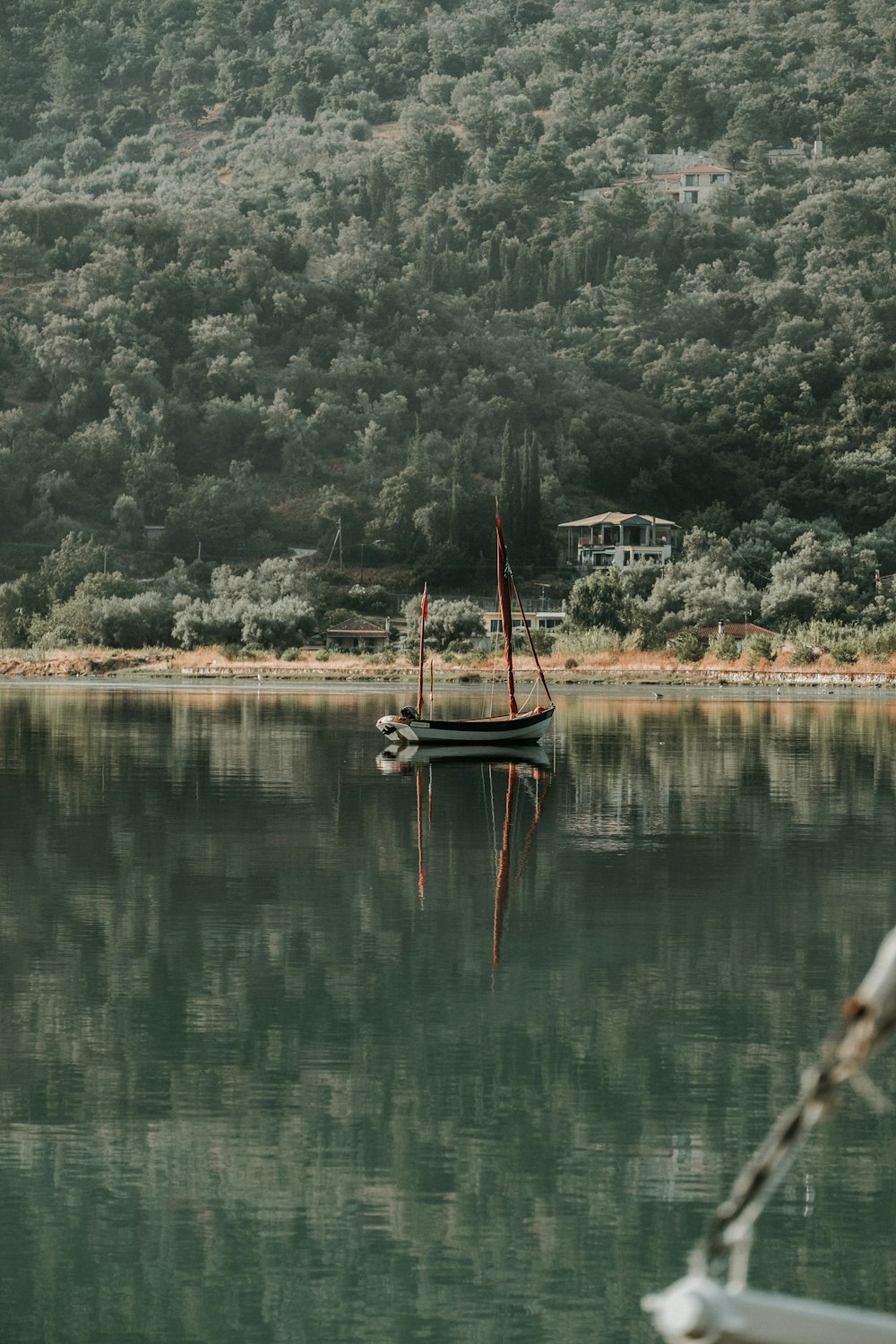 gray boat on body of water