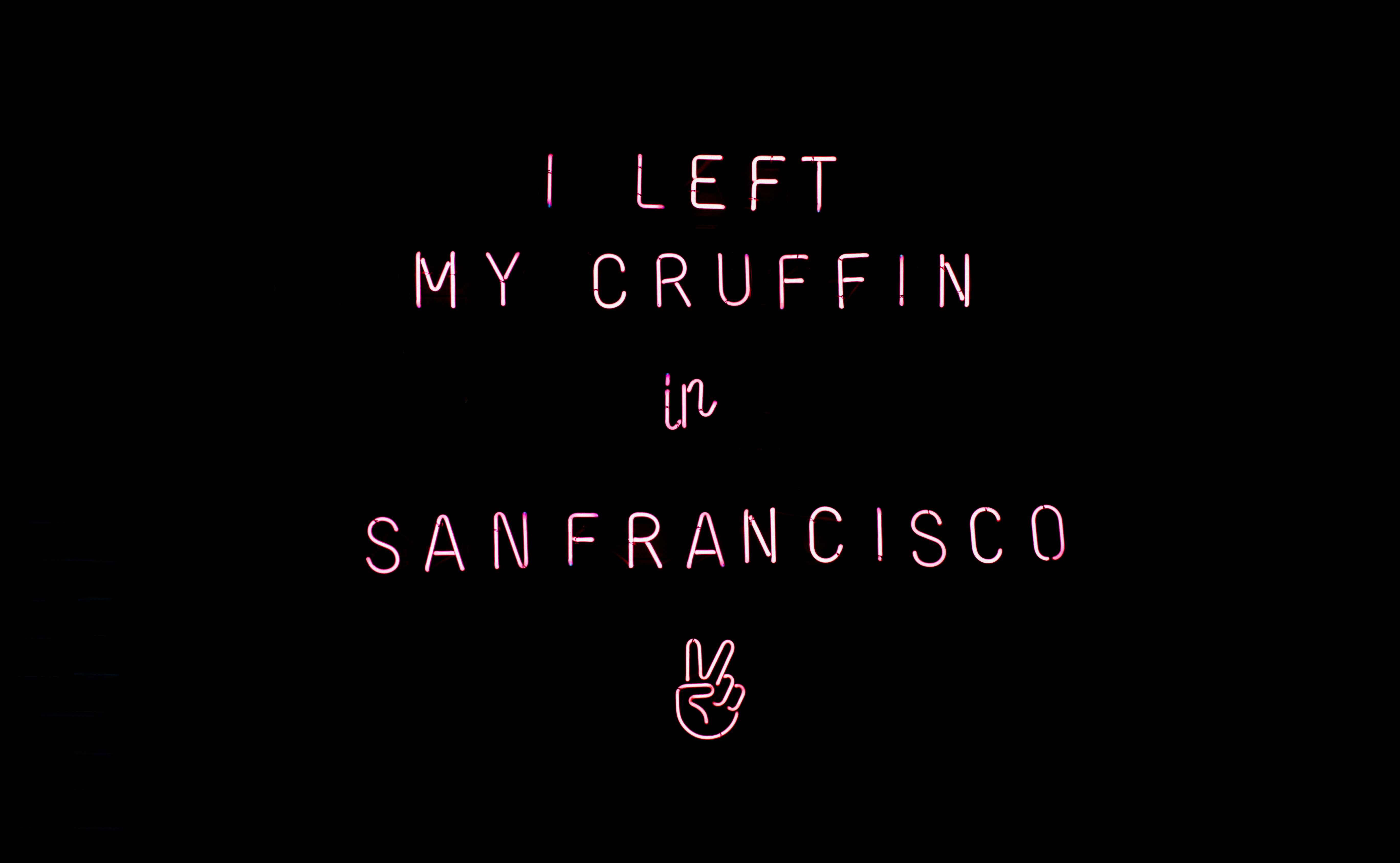 pink text on black background