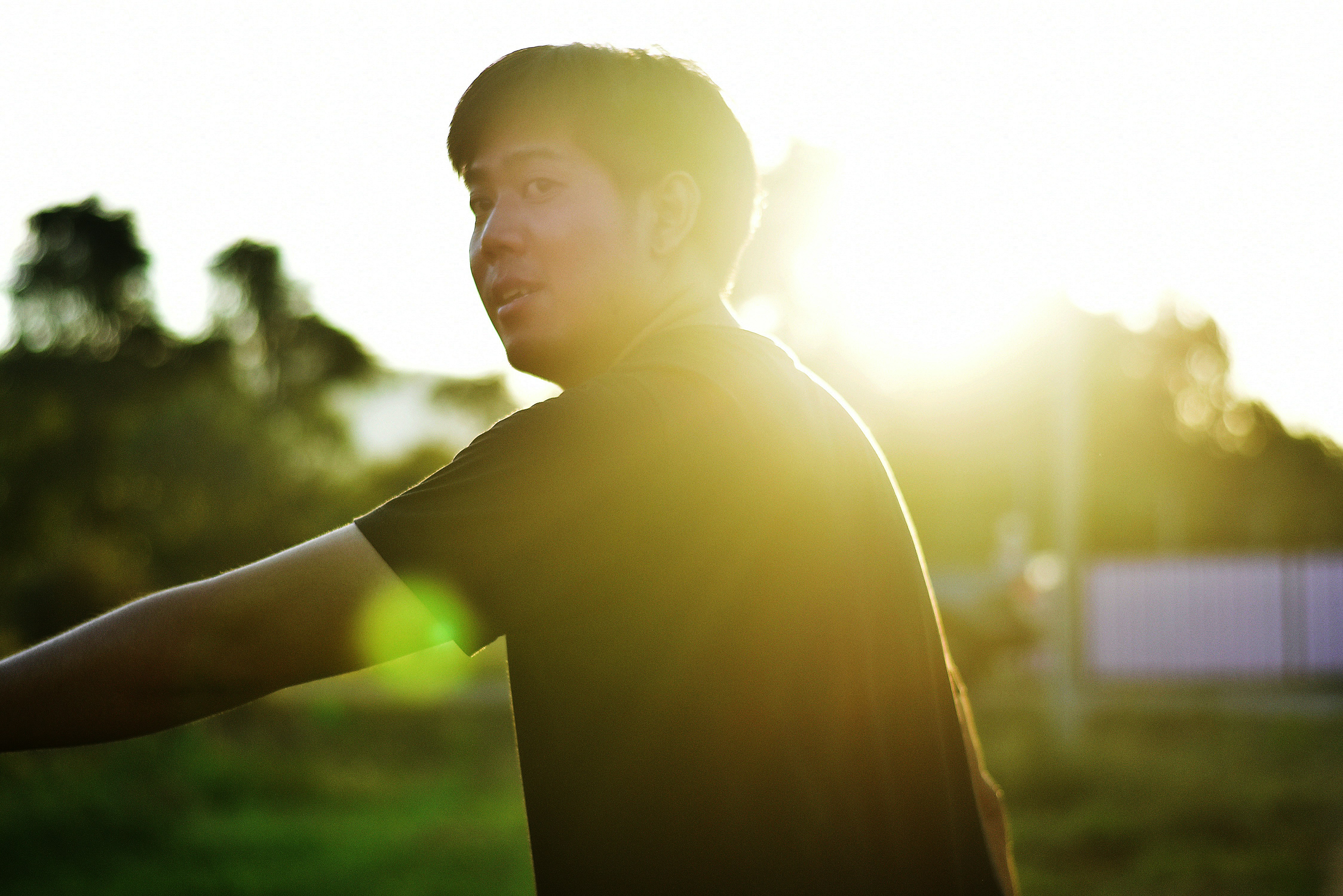 man standing near tree